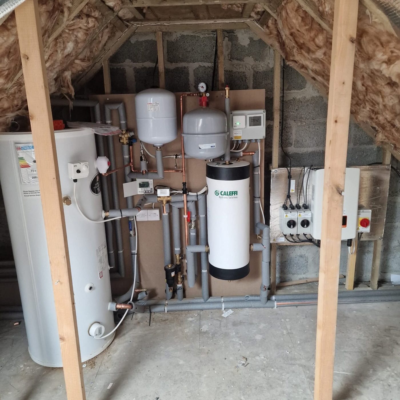 Domestic heating plant room with cylinder, buffer and expansion vessels