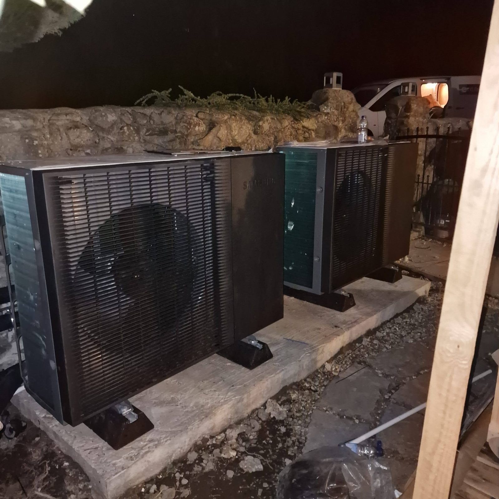 Commercial outdoor air conditioning units installed on a concrete base